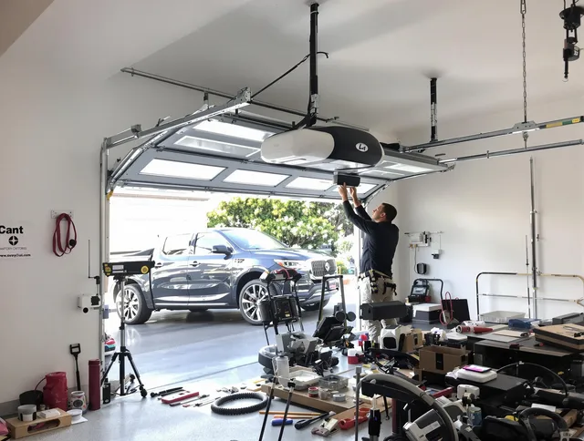 Branford Garage Door Repair specialist installing smart garage door opener system in Branford home