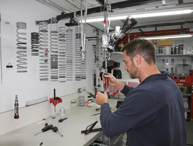 Branford Garage Door Repair safety certified technician performing precision spring replacement in Branford