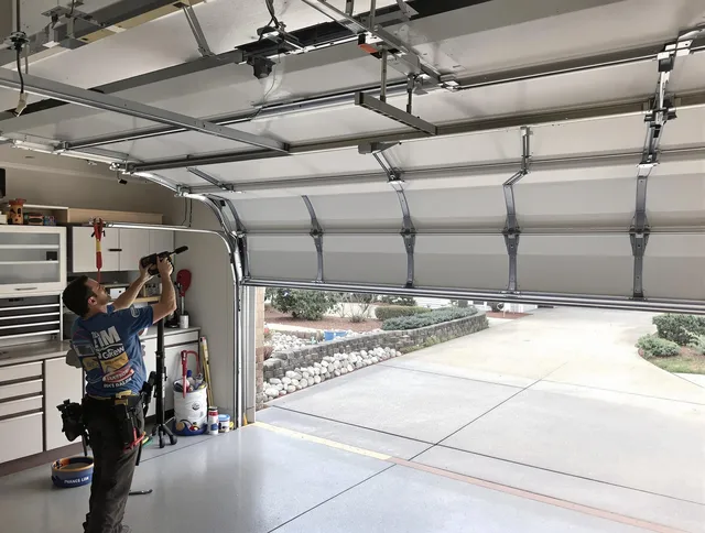Garage door track repair service by Branford Garage Door Repair in Branford